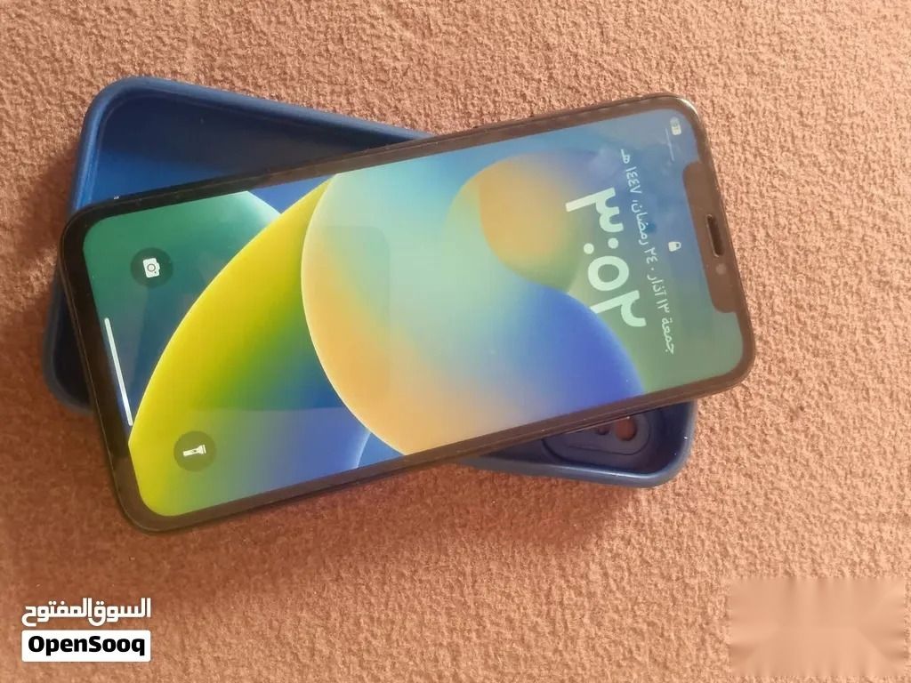 Apple iPhone XS — 125,000 د.ع