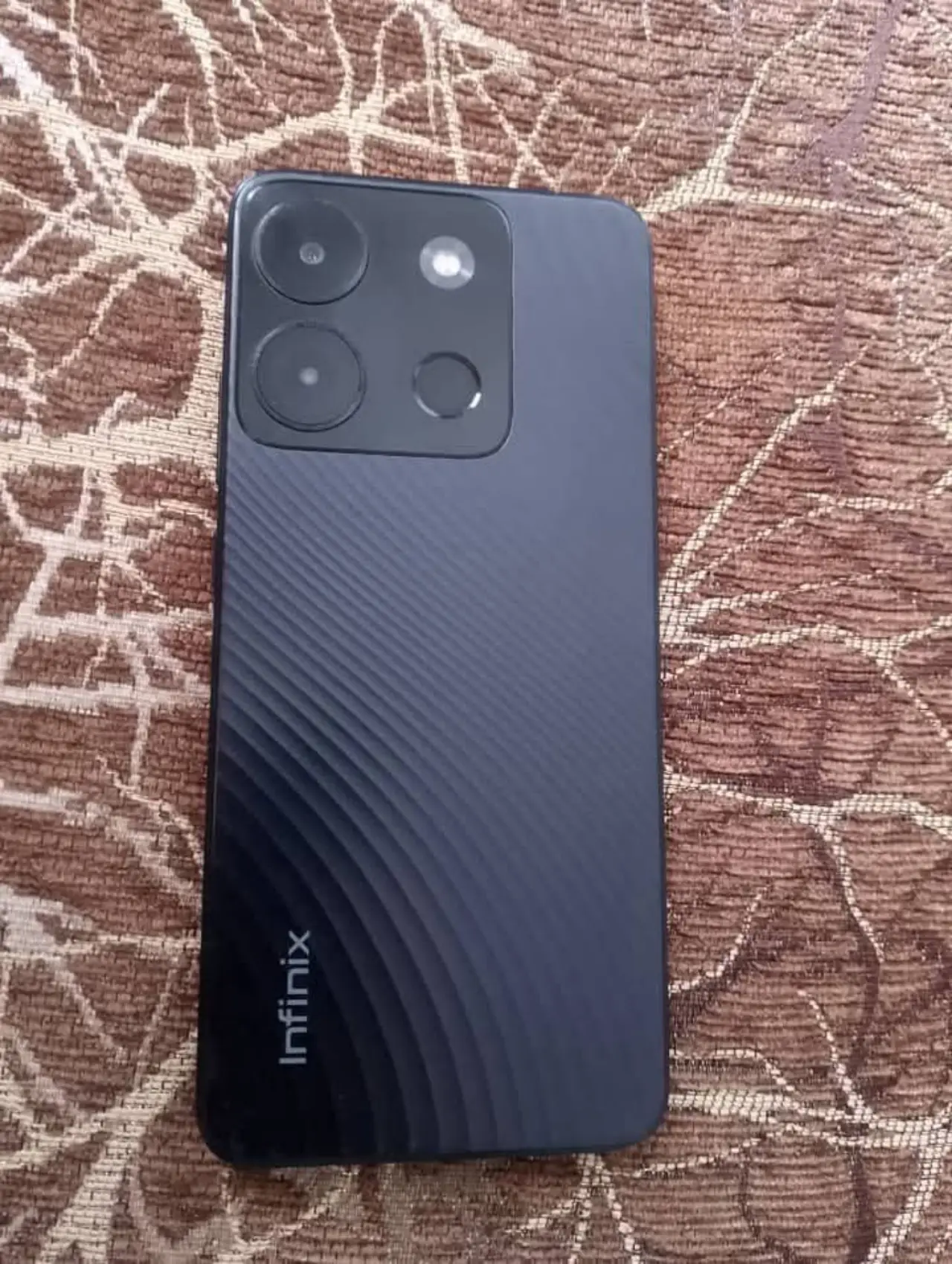 Infinix Smart 7 — 100,000 د.ع